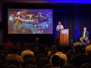 Augmented World Expo 2024, Somero Enterprises and ForgeFX Simulations, Revolutionizing Construction Training: Mixed Reality for Precision in Concrete Leveling & Placement: Step into the future of construction training with the latest innovation from Somero Enterprises, Inc.: A cutting-edge simulation-based training program for their Laser Screed machines, enhanced by the power of mixed reality technology. This state-of-the-art training solution, developed in collaboration with ForgeFX Simulations, harnesses the Meta Quest-based VR operator training simulator to provide an immersive learning experience. The training simulator marks a significant leap forward for Somero Concrete Institute, offering mixed reality-based operator and service training that prepares trainees for real-world scenarios without the need for the presence of physical equipment. ForgeFX Simulations, known for their custom 3D training simulation software development, has played a crucial role in bringing this application to life, creating a highly immersive, interactive, and engaging training environment. This session, co-presented by Dave Raasakka of Somero Enterprises, Inc., and Greg Meyers of ForgeFX Simulations, will highlight the industry's hurdles and the breakthrough solutions provided by mixed reality technology, discussing how mixed reality is reshaping training methodologies for cost savings, precision, and efficiency. This presentation is a must-see for industry professionals seeking to stay at the forefront of training methods and technologies in leading industry sectors like construction.
