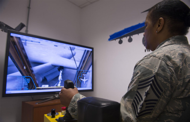 Chief Master Sgt. Shelina Frey Air Mobility Tests Deicing Simulator